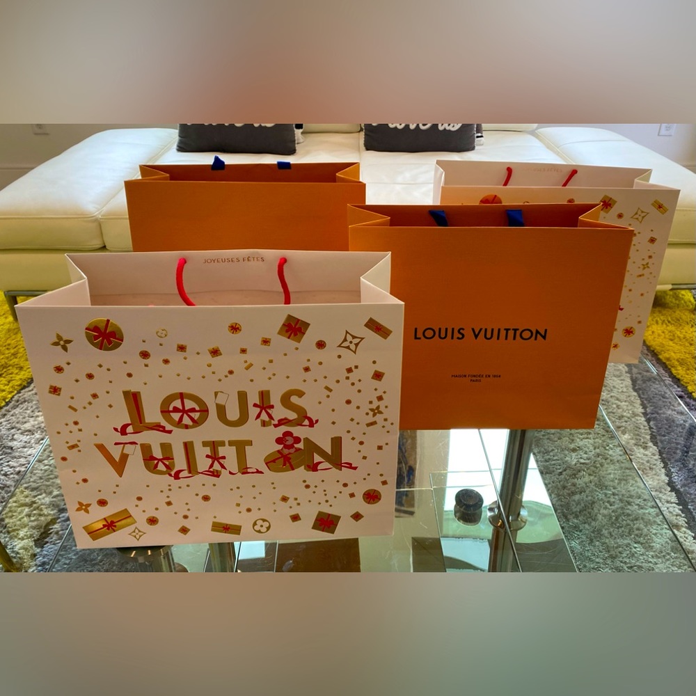 Authentic LV Paper Shopping Bag

Measurements 15.5”x 13.5” x 6.25”